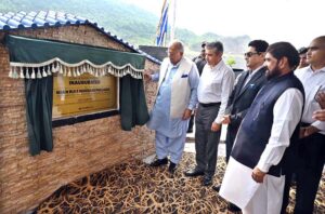 Federal Minister of Housing & Works Mian Riaz Hussain Pirzada unveiling plaque to inaugurate Commoners Bridge at Sky Gardens a project of Federal Government Employees Housing Authority Murree Expressway.