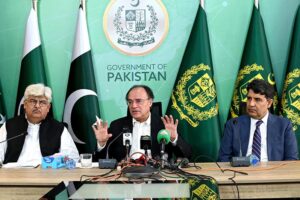 Federal Minister for Finance and Revenue Senator Muhammad Aurangzeb addressing a press conference at PTV Headquarter