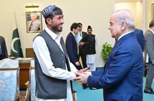 Muhib Ullah Kakar, an excavator driver who saved a family stranded in flash flood in Qilla Abdullah calls on Prime Minister Muhammad Shehbaz Sharif.