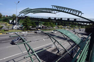Damaged shed at the I-8 stop for Blue Line Metro buses on Islamabad Expressway, awaiting repair for over a year.