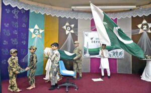 Students showcase their taekwondo skills during a ceremony held in connection with Defense Day at Khubaib Girls School and College.