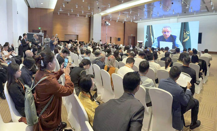 Federal Minister for Investment, Privatization and Communication Abdul Aleem Khan speaking via video message at 