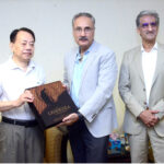 Secretary Economic Affairs Kazim Niaz presenting Gandhara Art Album to the President of Asian Development Bank Masatsugu Asakwa in Pakistan Monuments