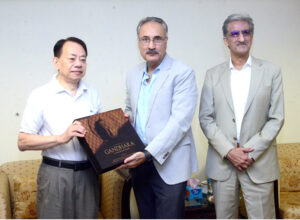 Secretary Economic Affairs Kazim Niaz presenting Gandhara Art Album to the President of Asian Development Bank Masatsugu Asakwa in Pakistan Monuments