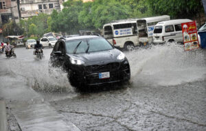 WASA MD Orders Rapid Drainage: Staff in action to prevent flooding after heavy rains, ensuring effective water management in Provincial Capital.