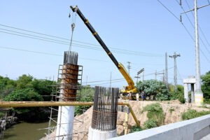 Labourers busy in work of flyover under construction 10th Avenue during development work in Federal Capital