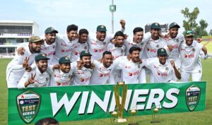 Bangladeshi team players pose for a photograph with trophy after winning Test series against Pakistan at Rawalpindi Cricket Stadium.