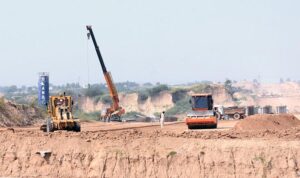 Heavy machinery being used during construction work of Rawalpindi Ring Road project, Rawalpindi Ring Road is 38.3 kilometer between the cities of Rawalpindi and Islamabad. Ring Road starts from Channi Alam Sher Bridge near Rawat and end near Thalian Interchange close to the Lahore-Islamabad Motorway.