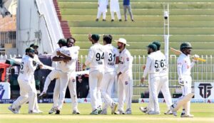 Pakistani players celebrate after taking the wicket of Bangladeshi batsman Mominul Haque during the 3rd day of the 2nd Test match between Pakistan and Bangladesh at the Rawalpindi Cricket Stadium