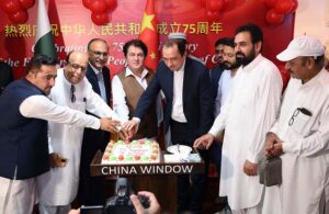 Advisor to Chief Minister Information & Public Relations of KP Barrister Dr. Muhammad Ali Saif and Administrator China Window Amjad Aziz malik along with other officials cutting cake during China 75th National Day Celebration at China Window.