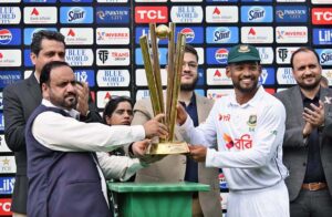 Bangladeshi team players pose for a photograph with trophy after winning Test series against Pakistan at Rawalpindi Cricket Stadium.