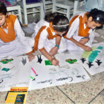 Students participating in painting competition on the occasion of Pakistan Defense Day in a local school at Latifabad