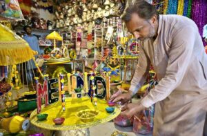 Vendors stock up on wedding decorations items in Flower Street as the wedding season begins in the city .