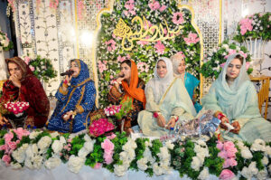 A group of female Naat Khawan reciting Naat during a Mehfil-E-Milad organized by the PPP Women Wing