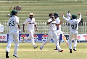 Pakistani players celebrate after taking the wicket of Bangladeshi batsman Mominul Haque during the 3rd day of the 2nd Test match between Pakistan and Bangladesh at the Rawalpindi Cricket Stadium