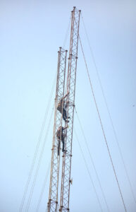 K-Electric technicians working on KE tower.