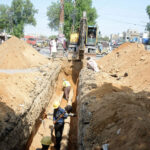 Machinery in use to repair the pipeline of Pak-Arab Refinery Company Ltd at Korangi Road