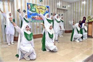 Student performing in a tableau to mark the Pakistan Defense Day at Government Girls Degree College