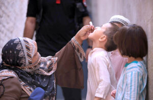 - A female health worker administering polio drops to a child during 7-day Pakistan Polio Eradication Programme 2024 in provincial capital.