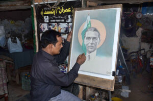 An artist is giving final touch to the portrait Quaid-e-Azam Muhammad Ali Jinnah at his workplace to mark the death anniversary of the founder of Pakistan.