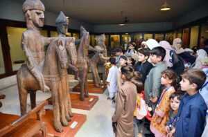 School children visit Peshawar museum in connection with World Tourism Day.