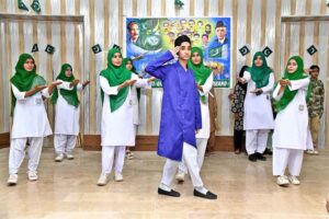 Student performing in a tableau to mark the Pakistan Defense Day at Government Girls Degree College