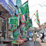 A vendor displays decorative items in connection of Eid Milad-un-Nabi