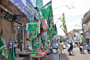 A vendor displays decorative items in connection of Eid Milad-un-Nabi