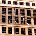Laborers busy in building construction work near F9 Park in the Federal Capital