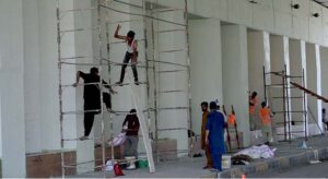 CDA workers are busy painting and repairing roadside edges at Zero Point to enhance the beautification of the federal capital.