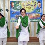 Student performing in a tableau to mark the Pakistan Defense Day at Government Girls Degree College