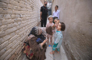 - A female health worker administering polio drops to a child during 7-day Pakistan Polio Eradication Programme 2024 in provincial capital.