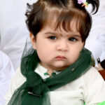 A minor girl participating in the the Eid Milad Un Nabi (PBUH) procession on its way at G-7