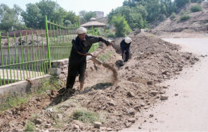 Laborers busy digging as part of ongoing development work in the city.