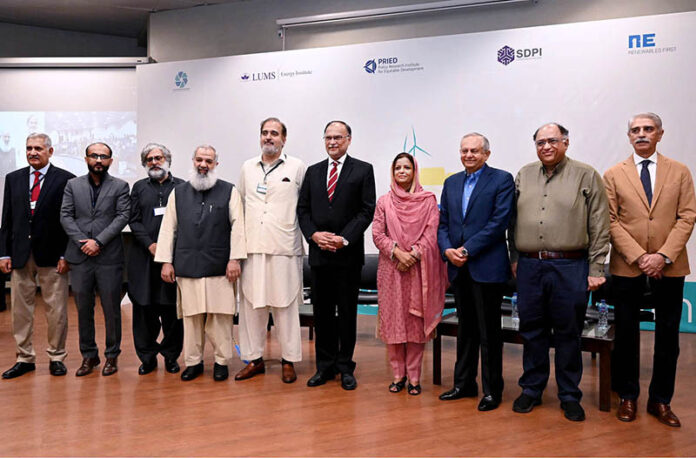 Federal Minister for Planning, Development & Special Initiatives, Ahsan Iqbal in a group photograpgh with the participants of Asia’s Energy Transition Summit at LUMS University