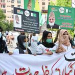 People participating in demonstration in front of Press Club to pay tribute to Kashmiri leader Syed Ali Geelani on 3rd death anniversary