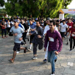 Participants take part in the 8th edition of the 'Save Tomorrow' Run & Walk, addressing the issue of drug abuse in society, hosted by the Karim Khan Afridi Welfare Foundation (KKAWF) at Fatima Jinnah Park (F-9) in the Federal Capital