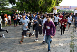 Participants take part in the 8th edition of the 'Save Tomorrow' Run & Walk, addressing the issue of drug abuse in society, hosted by the Karim Khan Afridi Welfare Foundation (KKAWF) at Fatima Jinnah Park (F-9) in the Federal Capital