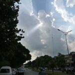 An attract view of sunrays peeping through clouds hovering over the skies of Federal Capital