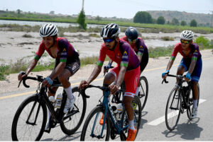 Cyclists participating in a Cycle Race from Karachi to Jhampir on National Highway on the eve of Defense and Air Force Day organized by SSGC near Jhirk