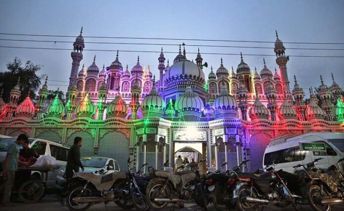 An illuminated view of Haji Baba Hayat Jamia Masjid decorated with colorful lights in connection with Eid Milad-un-Nabi(SAWW) Celebrations