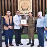 President Chamber of Commerce, Abdul Ghafoor Malik presenting a sheild to DPO Sialkot Rana Umar Farooq during his visit of SCCI