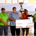 Pakistan Cycling Federation President, Syed Azhar Ali Shah giving away Winner Trophy of a cycle race from Karachi to Jhampir and Rs 50,000 Cheque to Cyclist Wazir on the eve of Defense and Air Force Day organized by SSGC near Jhirk