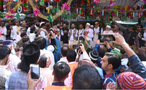 Pir Naqibur Rehman offering Dua to inaugurate the religious procession of Eid Milad-un-Nabi at Eid Gah Sharif