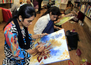 A student adds the final strokes to her calligraphy masterpiece under the mentorship of the Knowledge of Art Academy at The Fortnight School System.