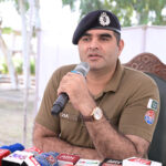 SP Headquarters Ziaullah addresses a press conference during a ceremony at Police Line, where stolen property is handed over to its rightful owners
