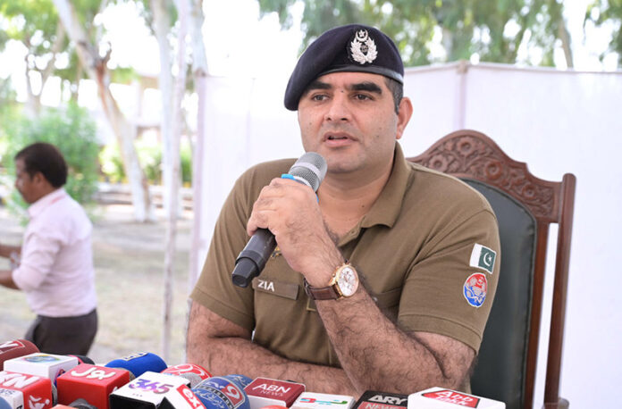 SP Headquarters Ziaullah addresses a press conference during a ceremony at Police Line, where stolen property is handed over to its rightful owners