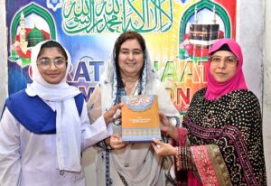 Principal Prof. Samina Naz Abro in group photo with students and other teachers participating of Qirat-O-Naat Competition at Begum Nusrat Bhutto Government Girls Degree College.