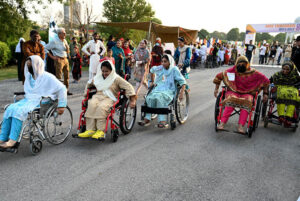 Disabled individuals participate in the 8th edition of the 'Save Tomorrow' Run & Walk, highlighting the issue of drug abuse in society, hosted by the Karim Khan Afridi Welfare Foundation (KKAWF) at Fatima Jinnah Park (F-9) in the Federal Capital