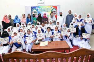 Principal Prof. Samina Naz Abro in group photo with students and other teachers participating of Qirat-O-Naat Competition at Begum Nusrat Bhutto Government Girls Degree College.